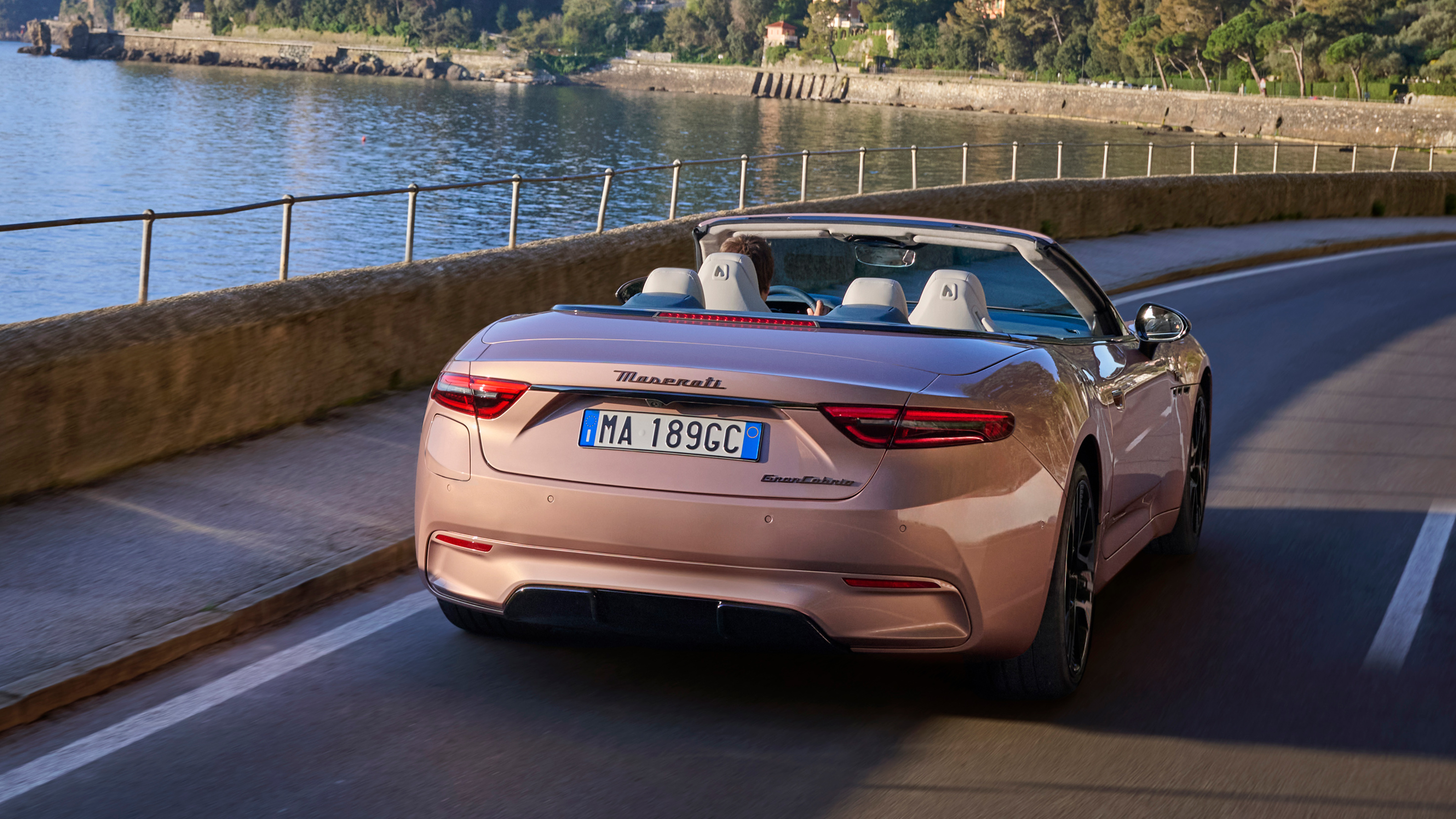 Maserati GranCabrio Folgore rear 3/4 on an italian road