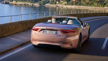 Maserati GranCabrio Folgore rear 3/4 on an italian road