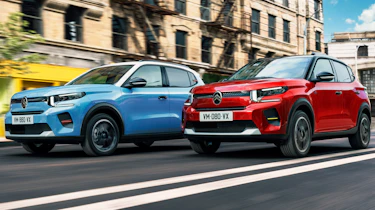 New Citroen C3 supermini - red and blue cars dynamically driving