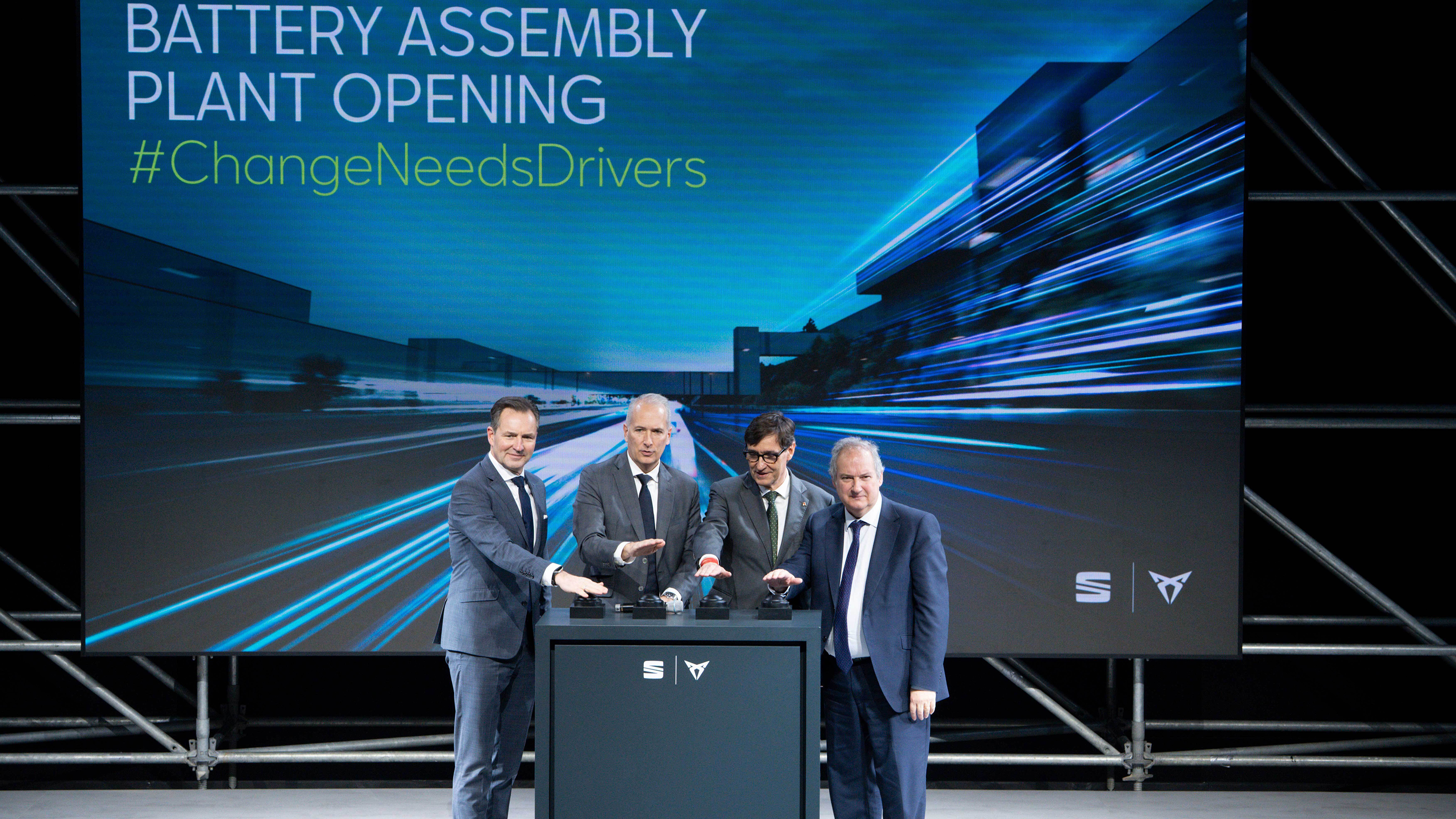 Cupra executives standing on a stage