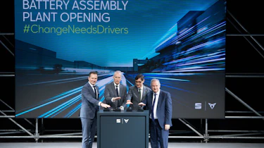Cupra executives standing on a stage