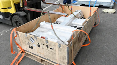 Battery recycling process - Complete battery floorplan being pulled from crate