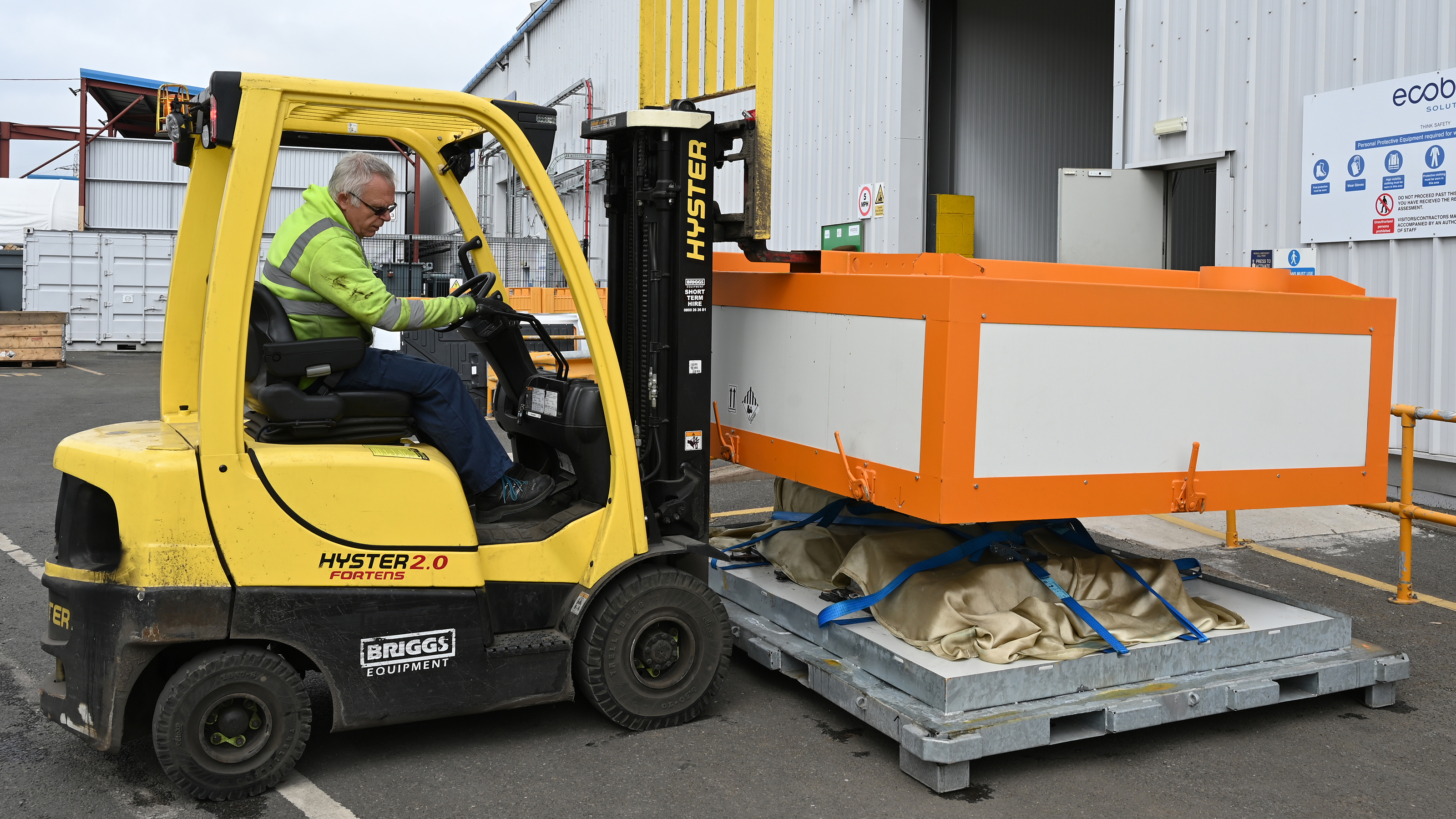 Battery recycling process - Complete battery floorplan being pulled from crate