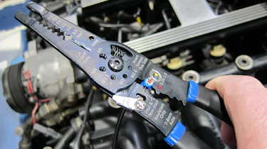 Laser Multi-purpose Stripper, Crimper & Cutter 8785 - in use