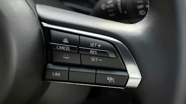 Mazda 3 steering wheel cruise control buttons