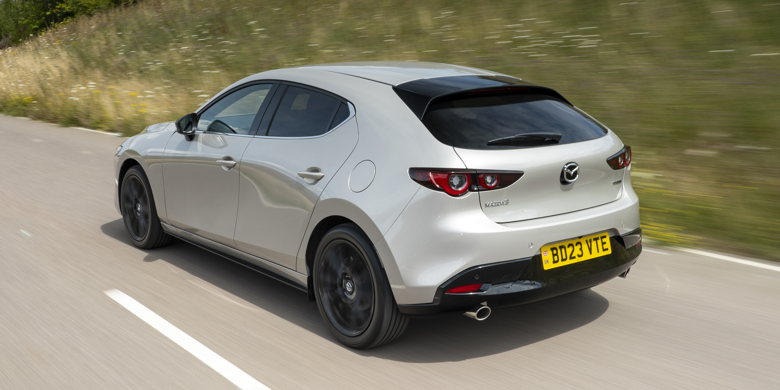 Mazda 3 rear corner tracking left