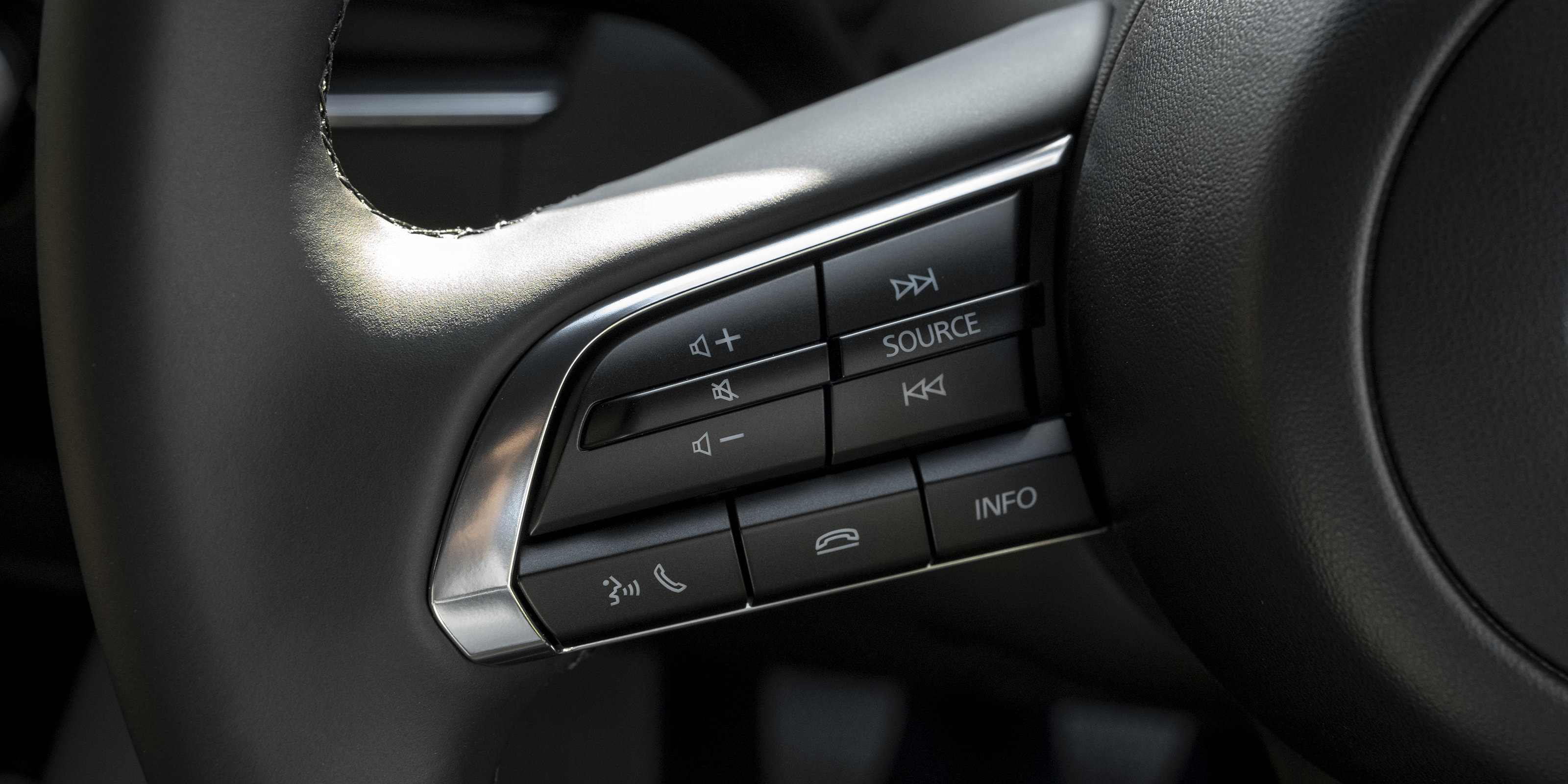 Mazda 3 steering wheel audio controls