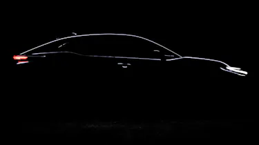 Teaser image of Toyota's upcoming electric SUV - side