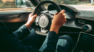Rimac Nevera EV hypercar - interior dynamic driving shot