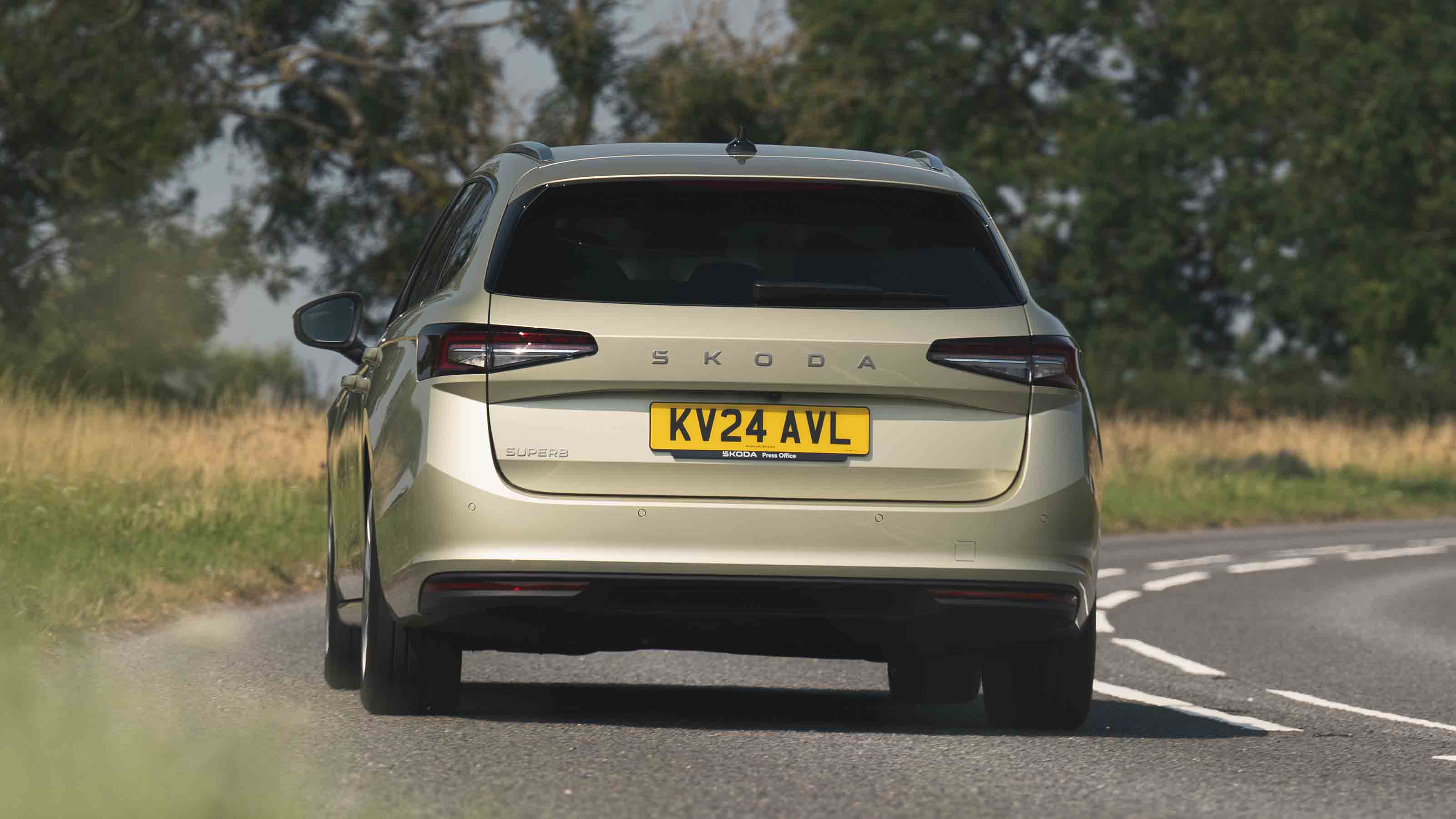 Skoda Superb Estate - rear full width image