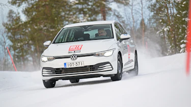 VW Golf in snow - front