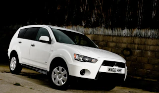 White Mitsubishi Outlander 4Work (2008-2012) van