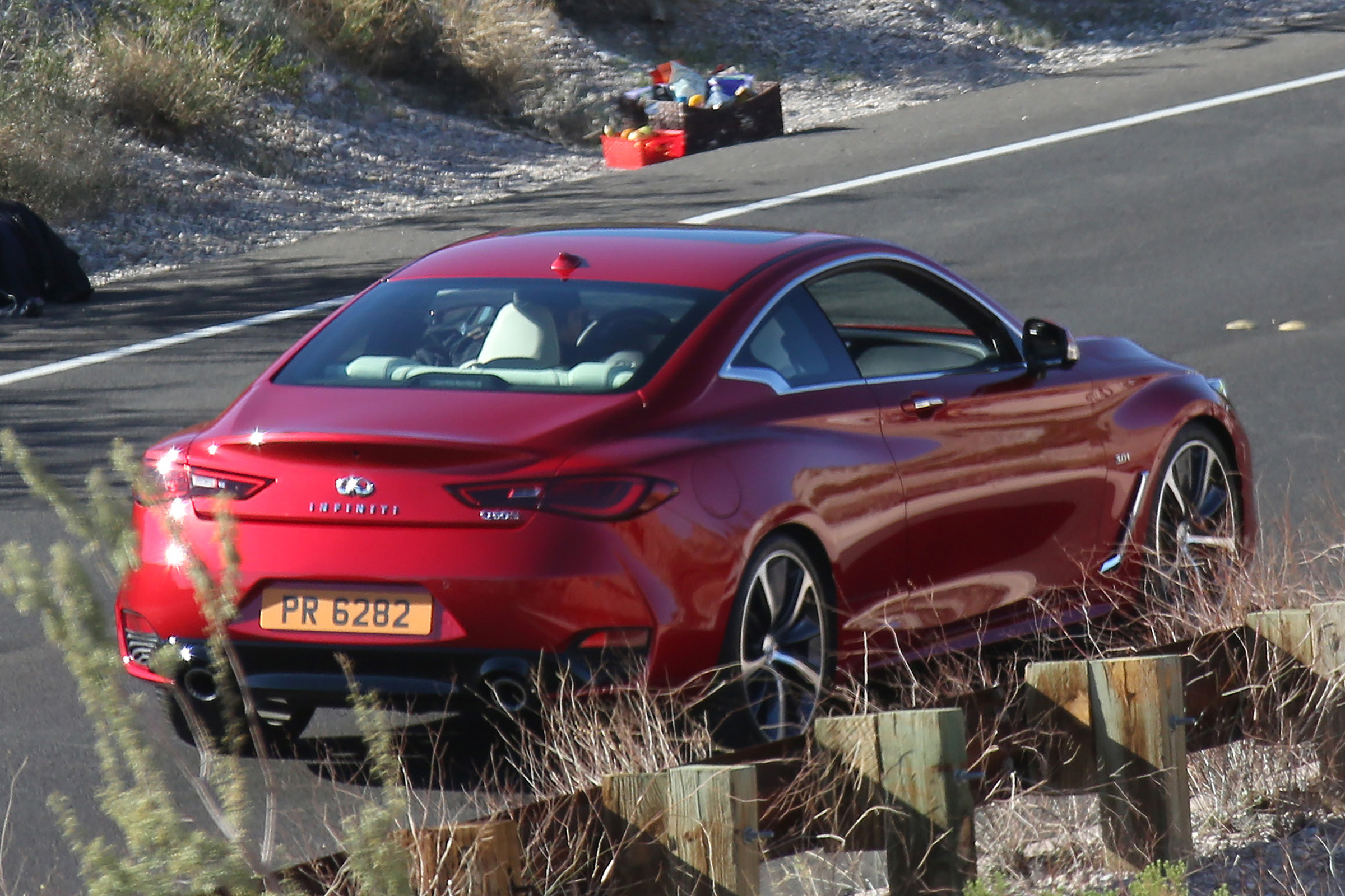 Infiniti Q60 rear side