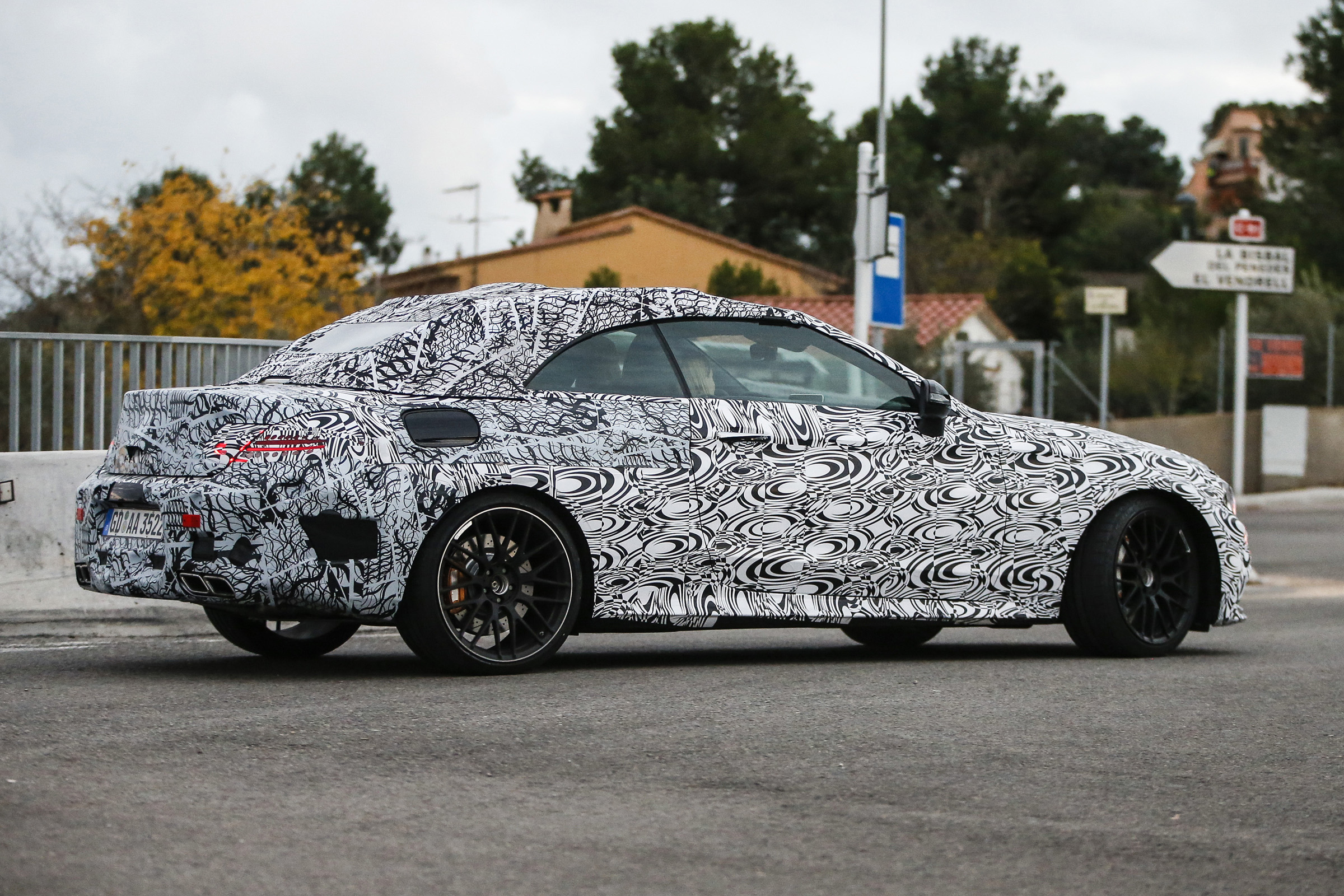 Mercedes C63 AMG Cabrio side rear