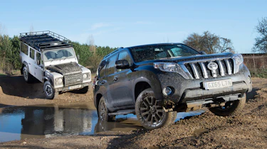 Land Rover Defender vs Toyota Land Cruiser - header