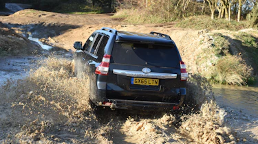 Land Rover Defender vs Toyota Land Cruiser - Toyota rear off road
