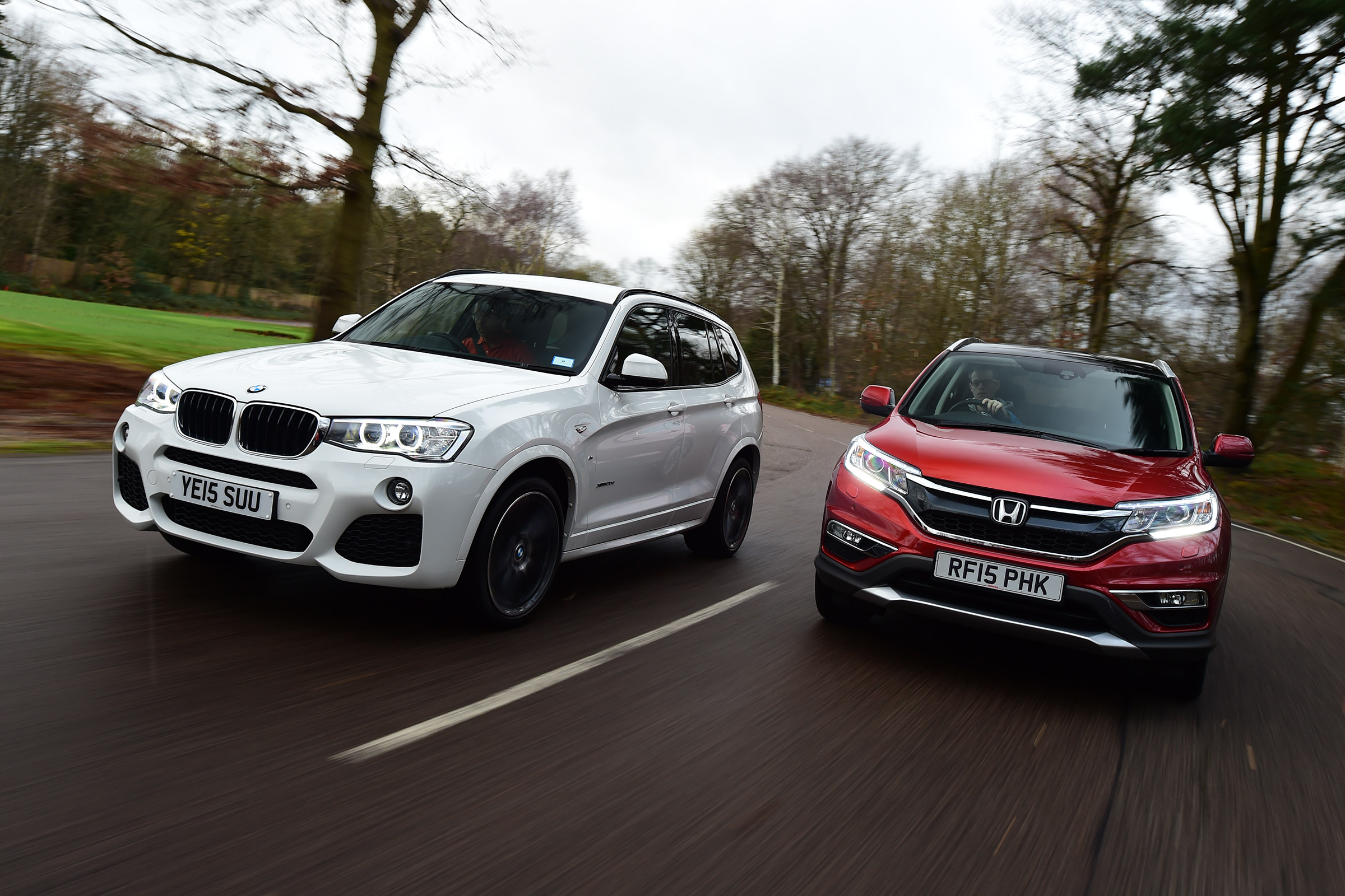 Used BMW X3 vs New Honda CR-V - front driving