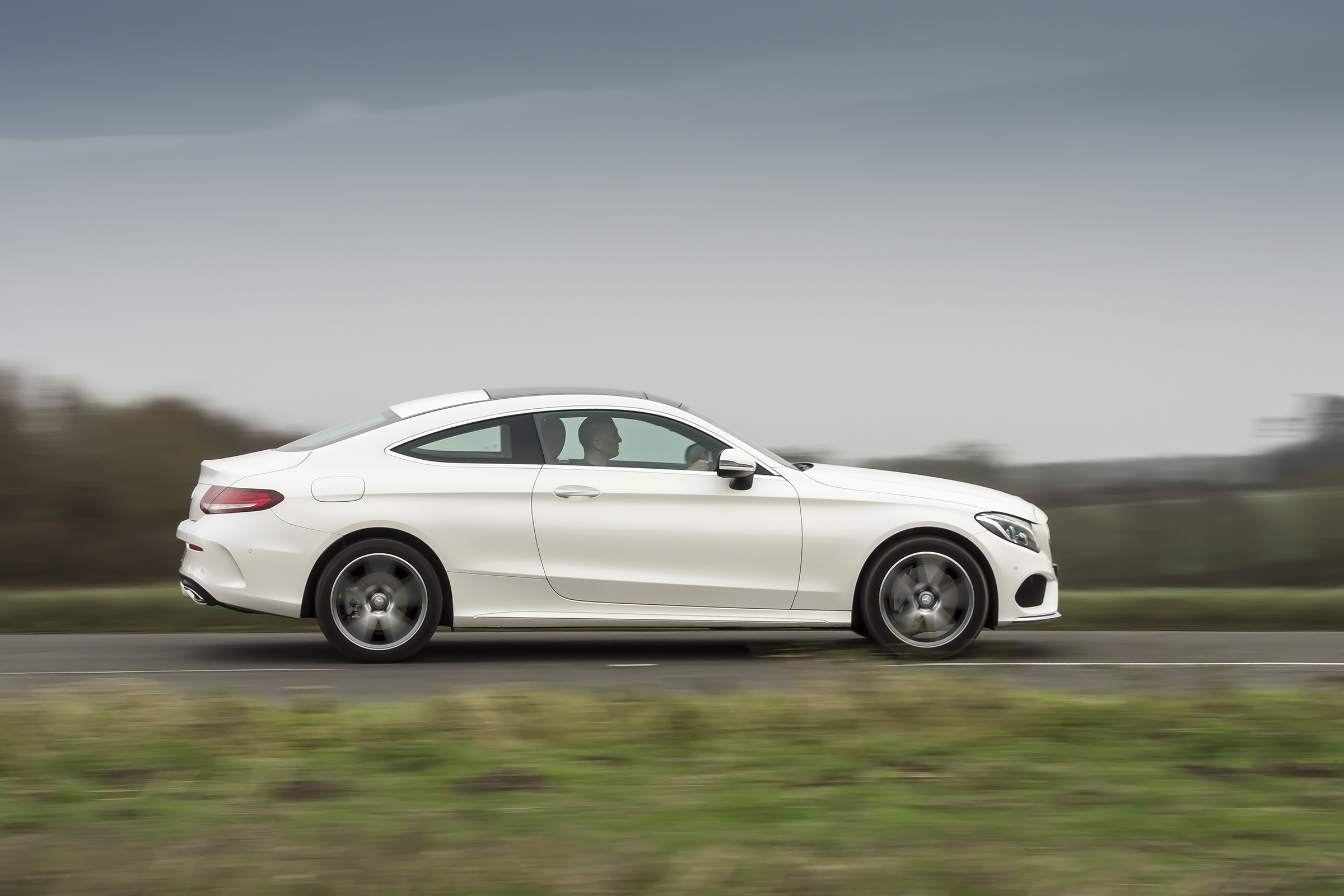 Mercedes C-Class Coupe C250d AMG Line - side tracking