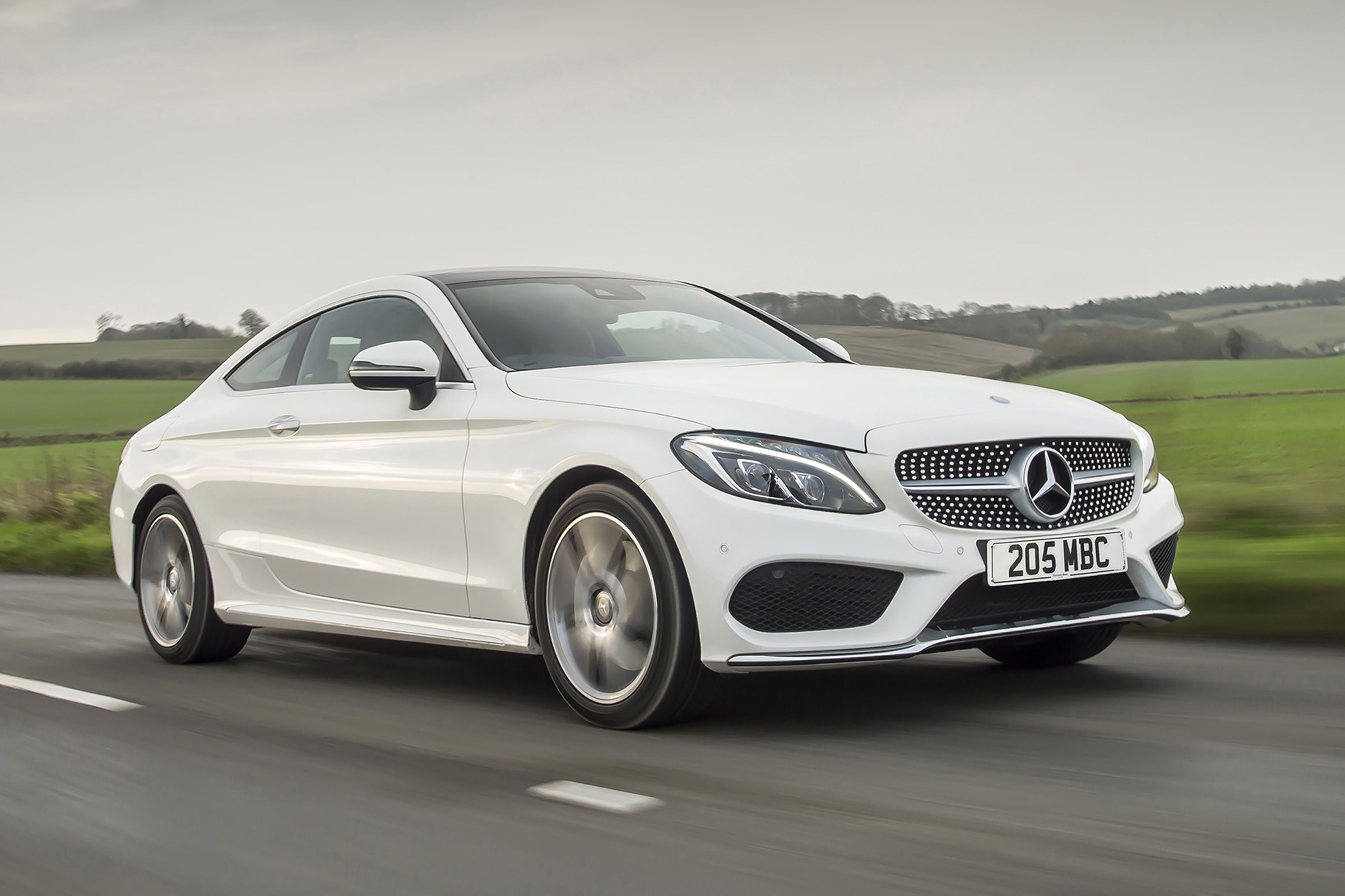 Mercedes C-Class Coupe C250d AMG Line - cropped front tracking