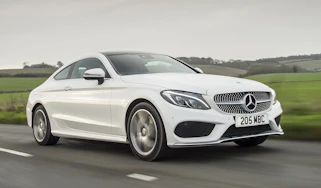 Mercedes C-Class Coupe C250d AMG Line - cropped front tracking