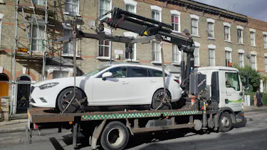 Foreign car clampdown - on truck