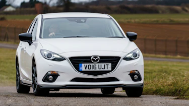Mazda 3 Sport Black - front cornering