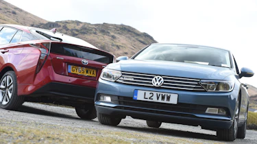 Volkswagen Passat vs Toyota Prius - head-to-head