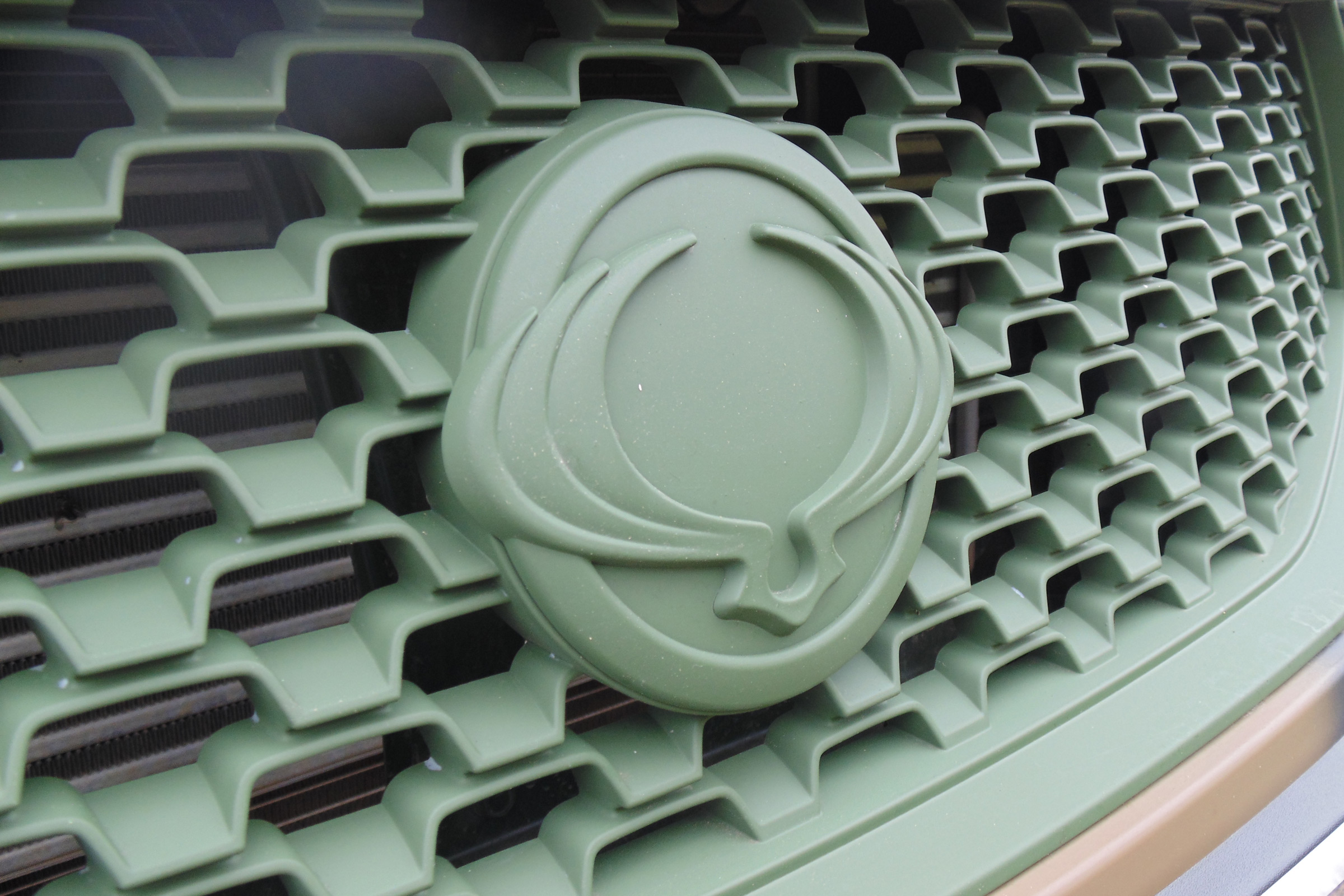 SsangYong Korando Sports DMZ - badge