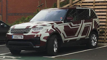 Land Rover Discovery 2017 red disguise