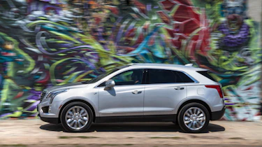 Cadillac XT5 SUV 2016 - side tracking
