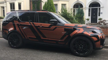 Land Rover Discovery 2017 - spy shot orange side