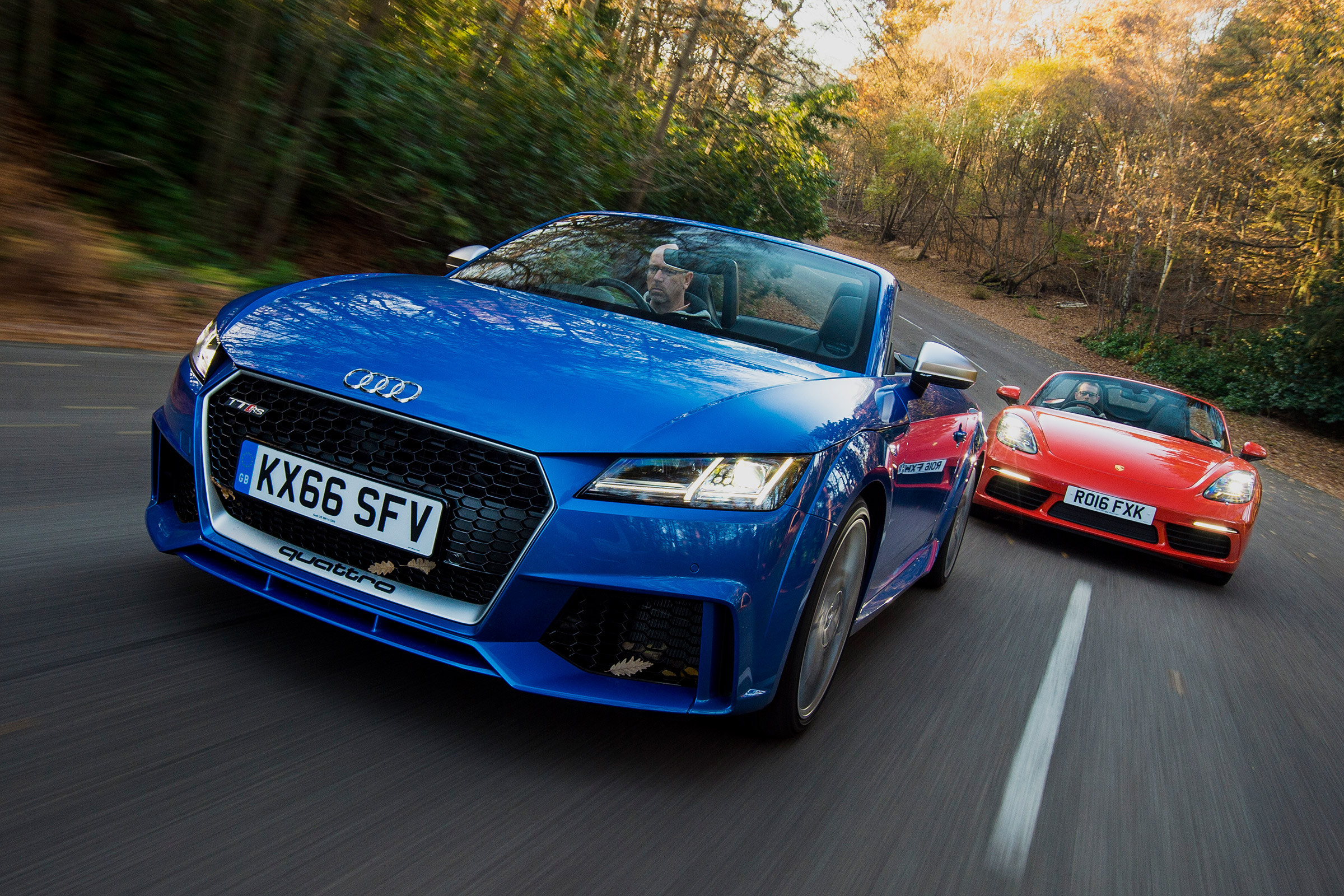 Audi TT RS vs Porsche 718 Boxster S - header