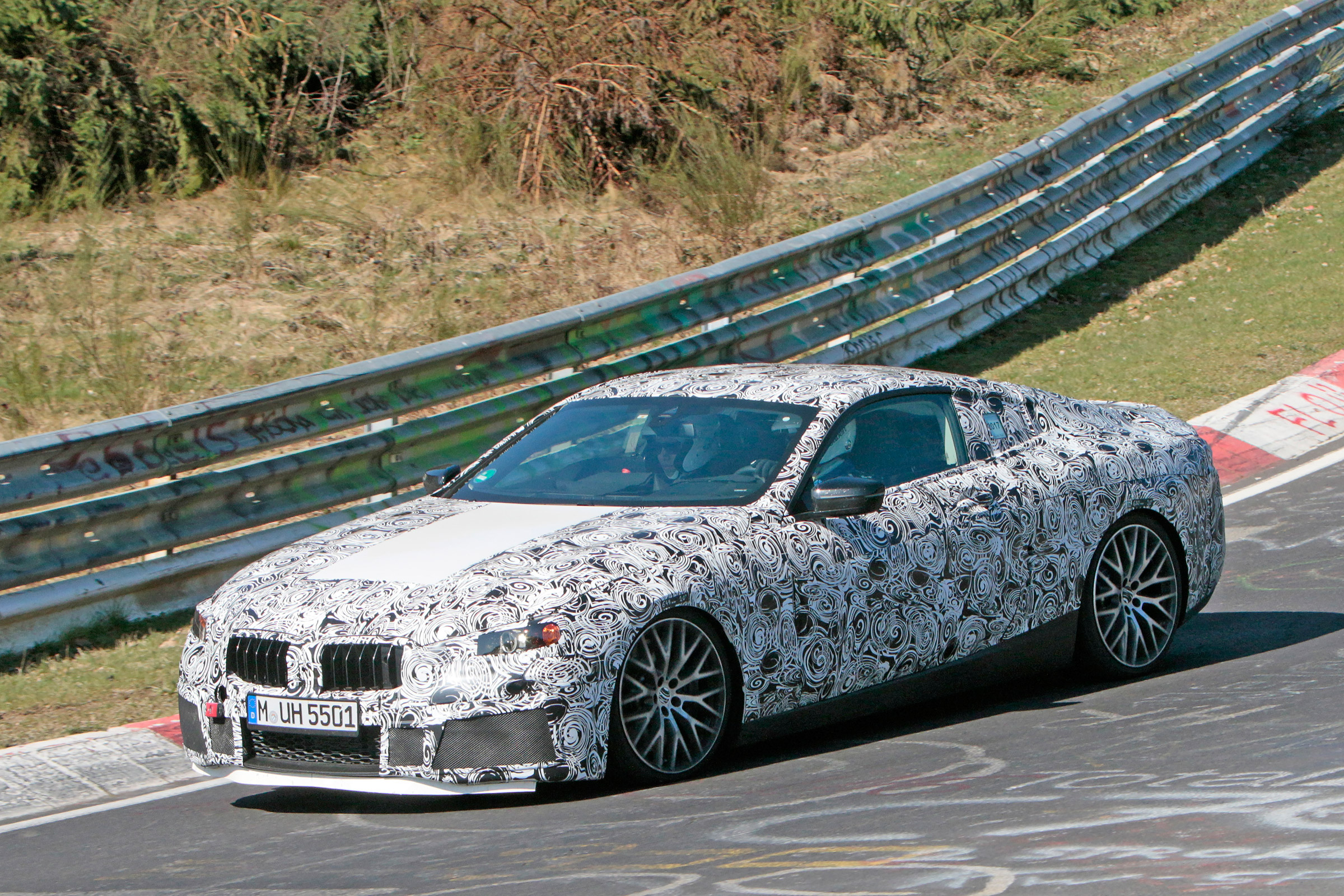 2018 BMW M8 spy shot front quarter