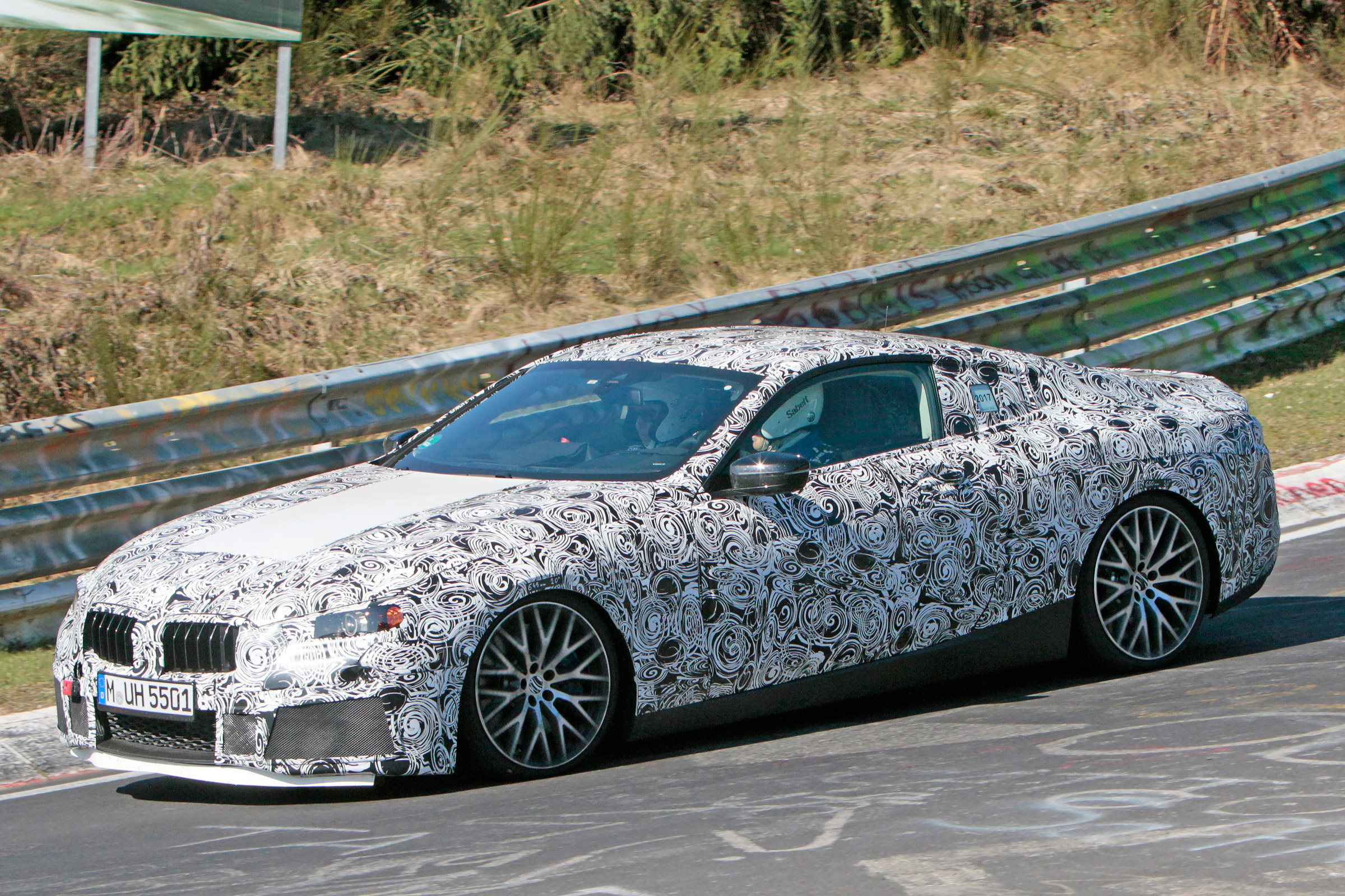 2018 BMW M8 spy shot front quarter