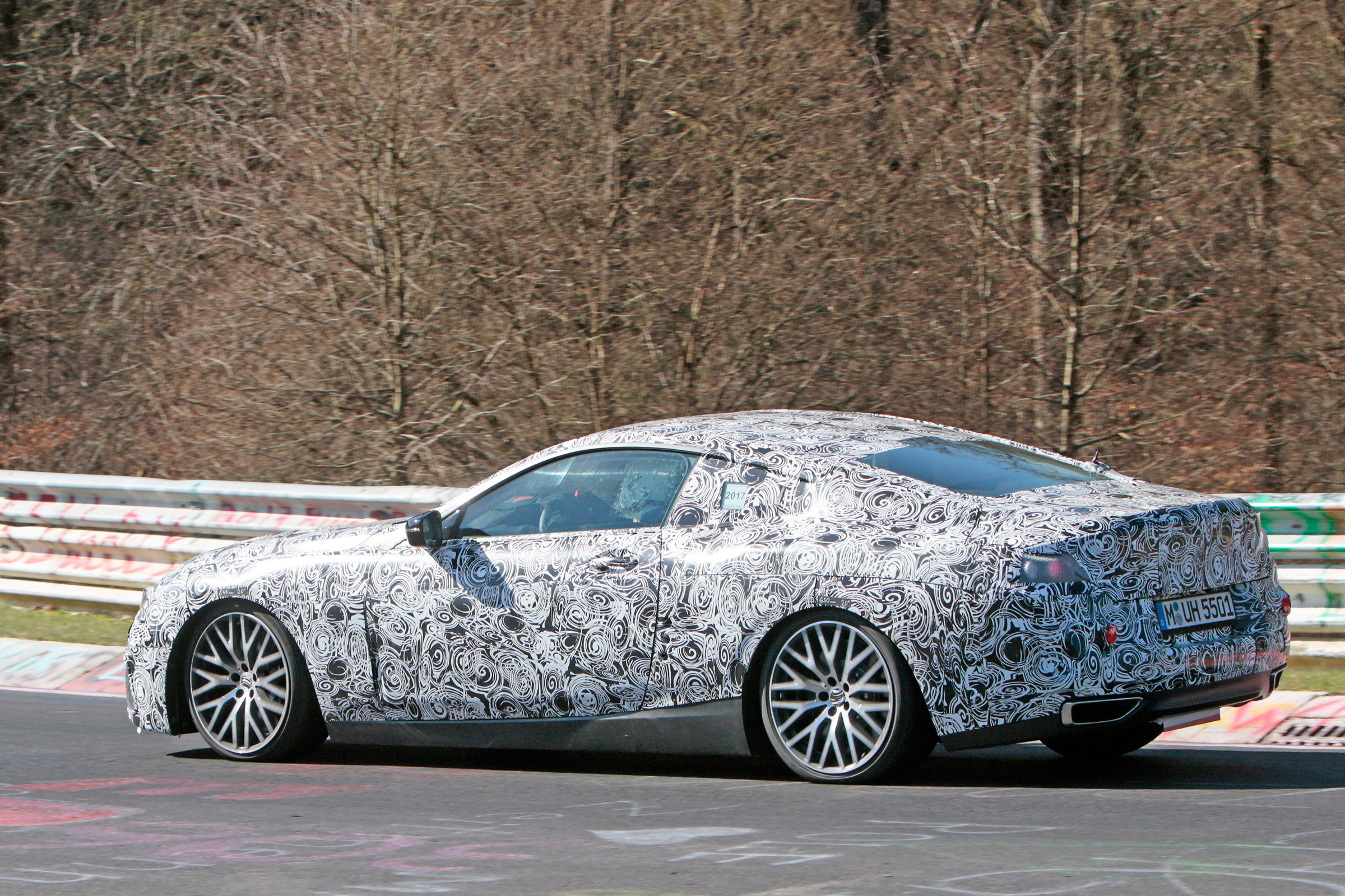 2018 BMW M8 spy shot side