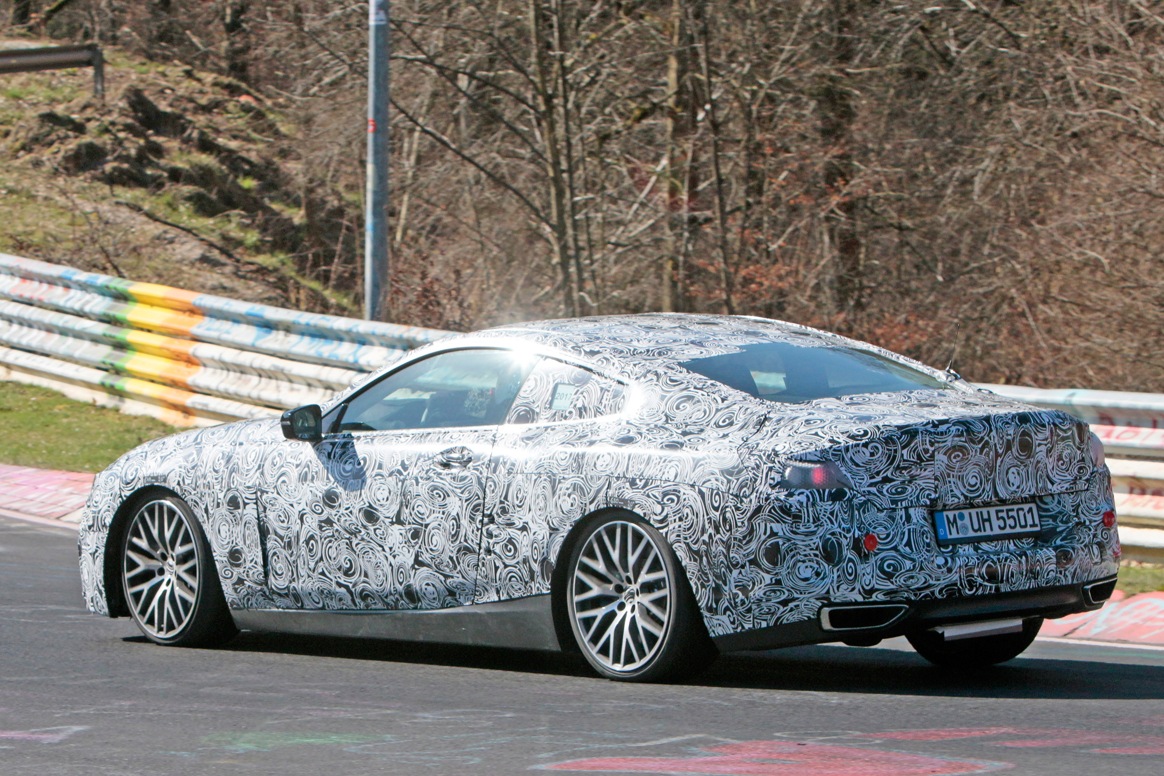 2018 BMW M8 spy shot rear quarter