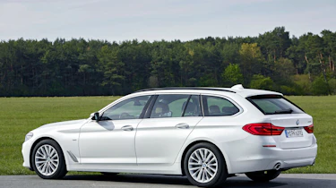 BMW 5 Series Touring - side static