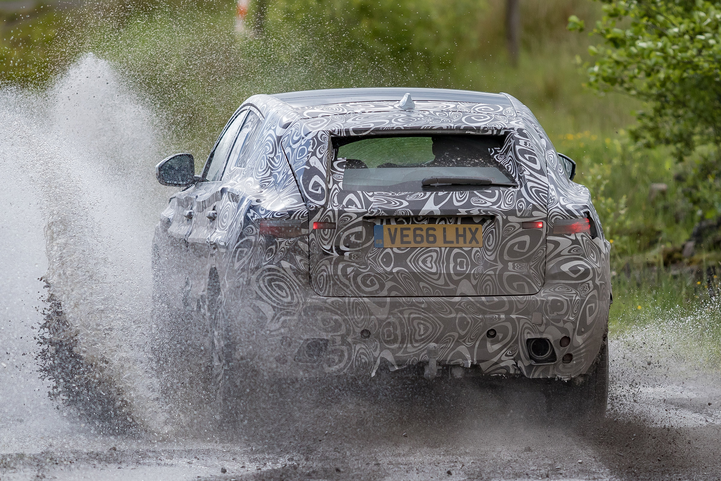 Jaguar E-Pace official spy shot cold off-road