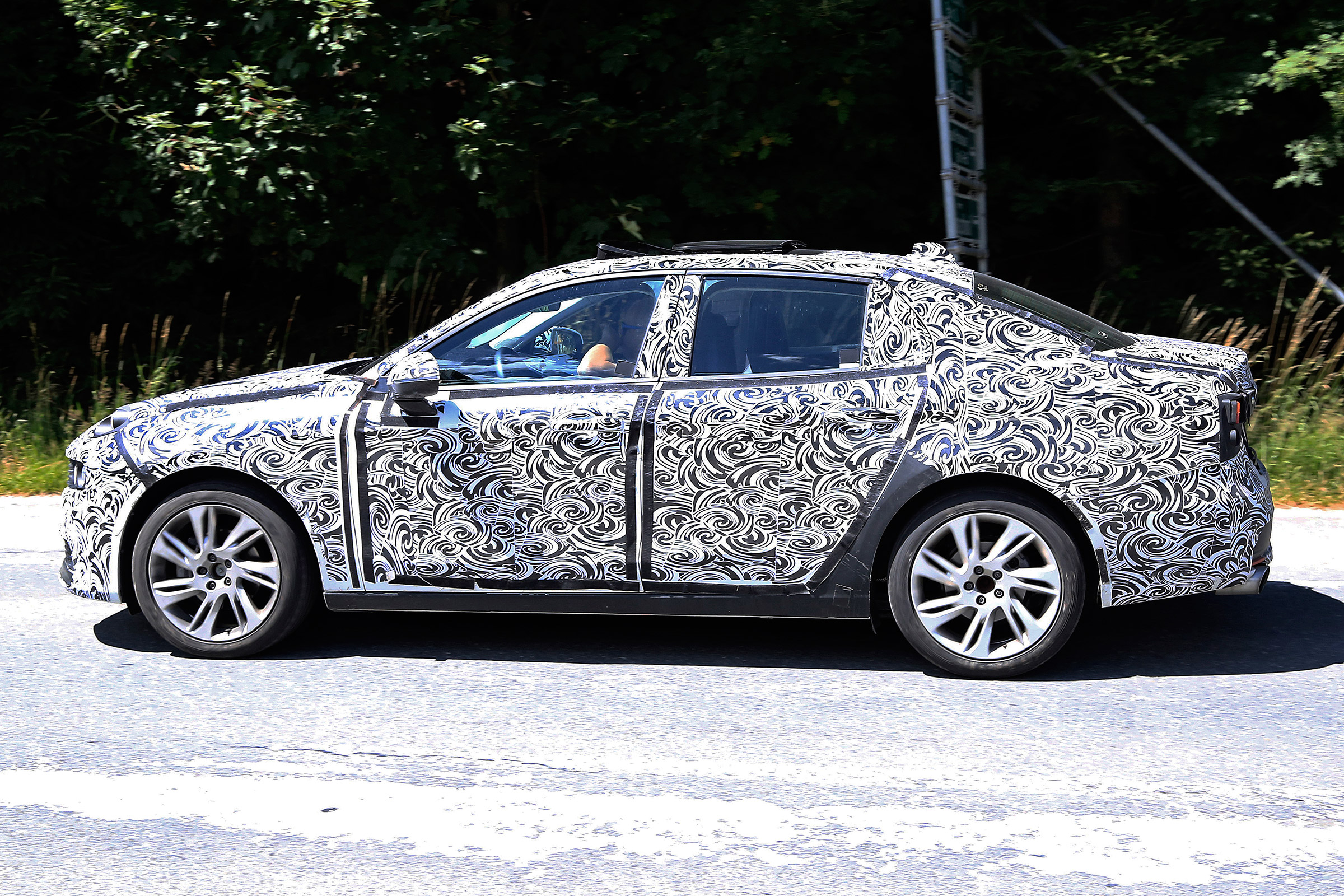 Lynk &amp; Co 03 spy shots side profile