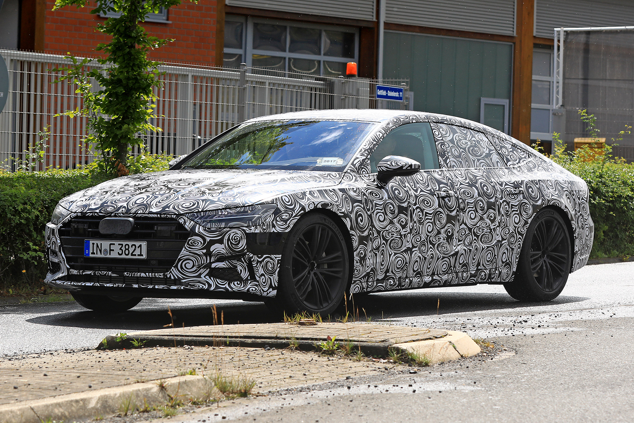 New 2018 Audi A7 spy shot front quarter