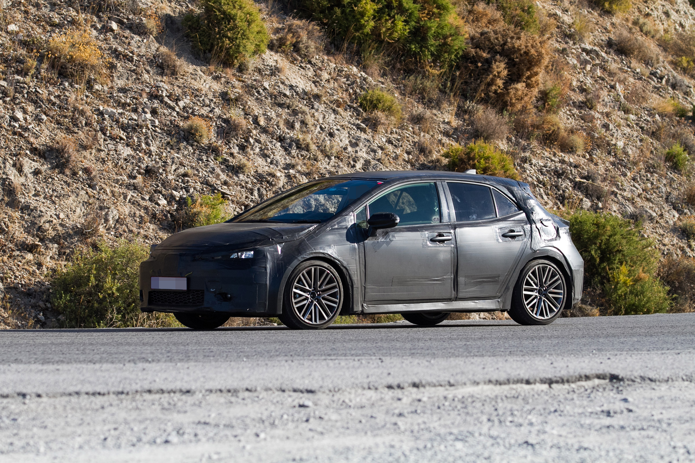 New Toyota Auris spied side front