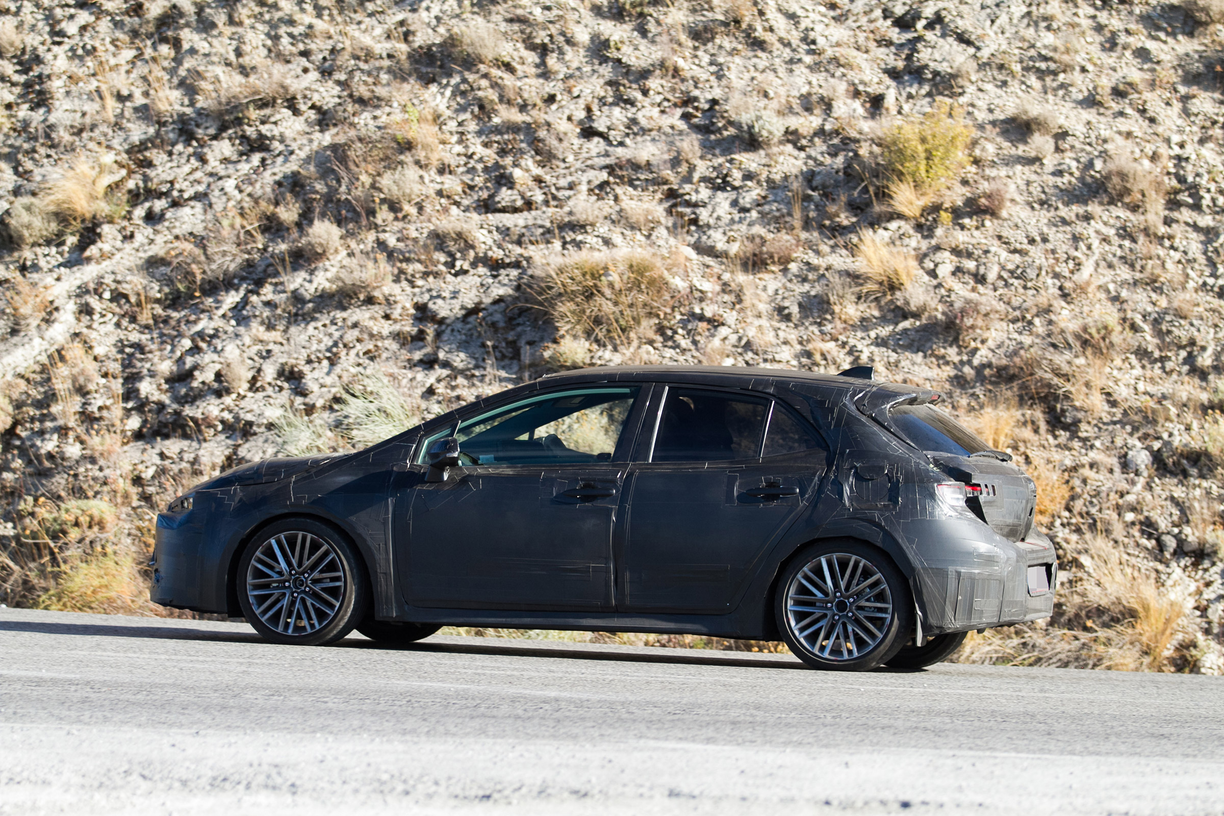 New Toyota Auris spied side rear
