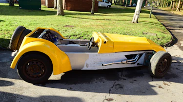 Yellow classic car - side