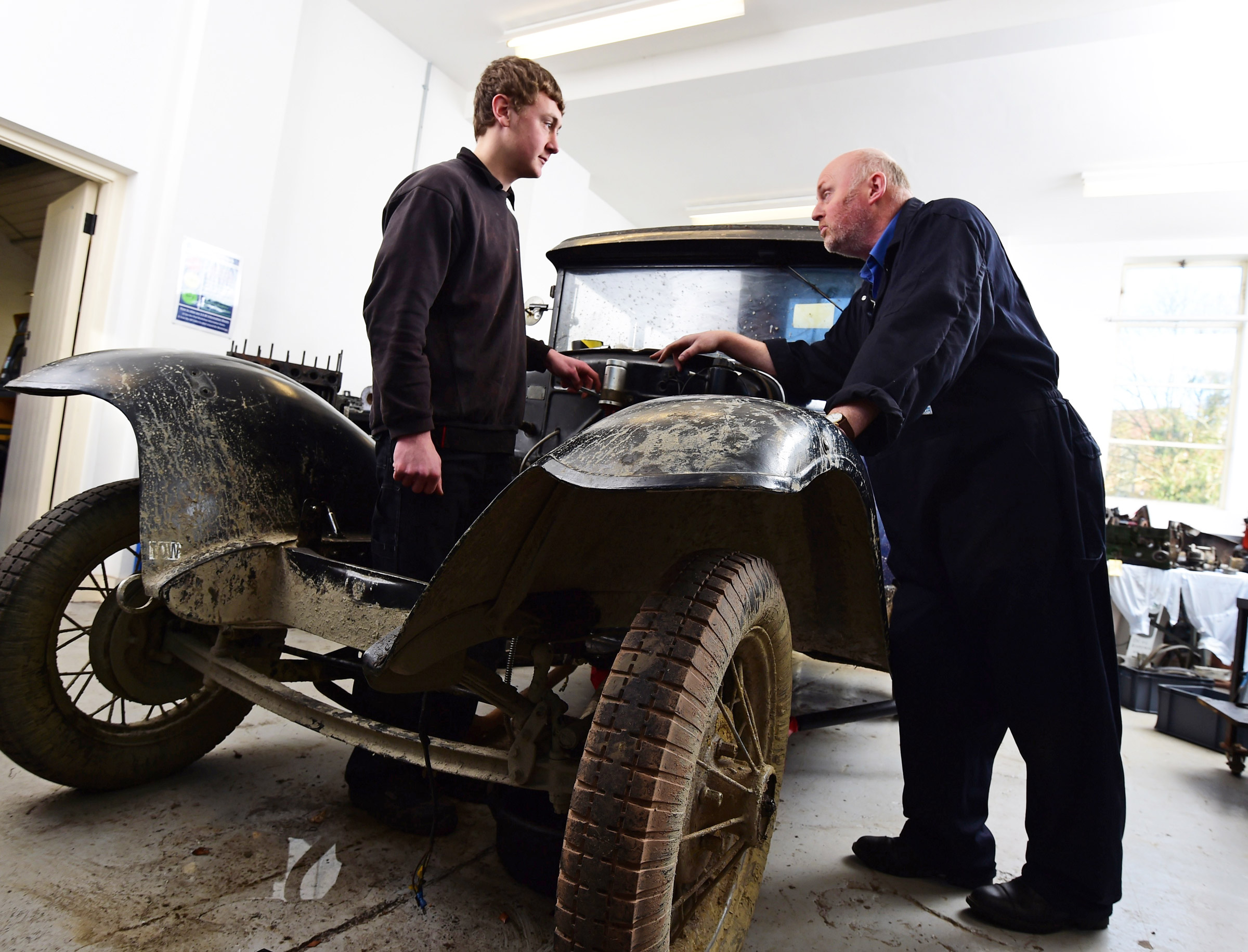 Classic car with mechanics
