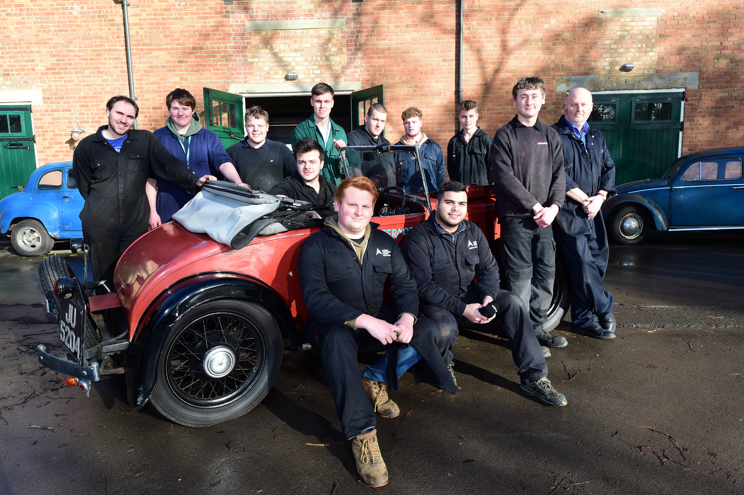 Students with classic car