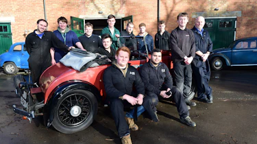 Students with classic car