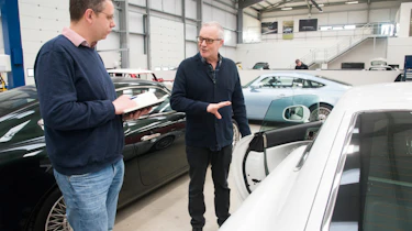 Hugo Griffiths and David Brown inspect cars