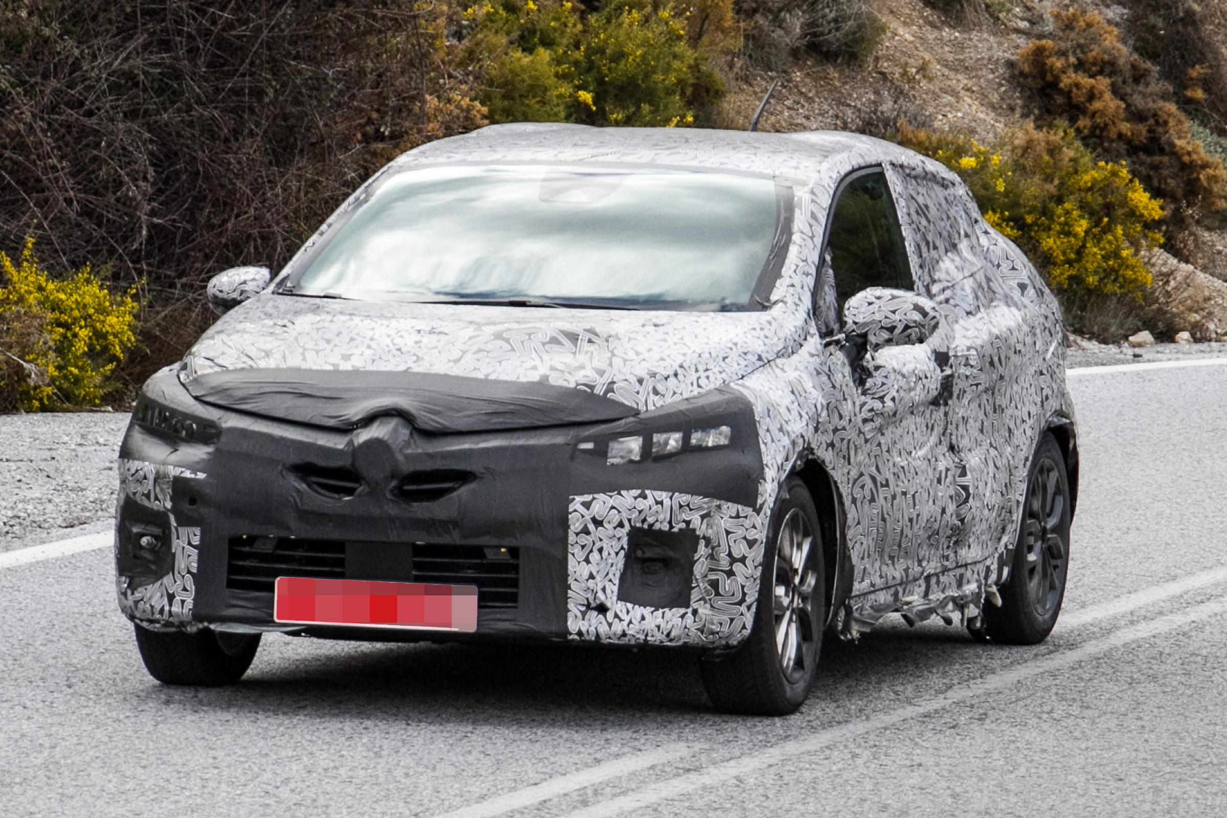 2019 Renault Clio spy shot front quarter