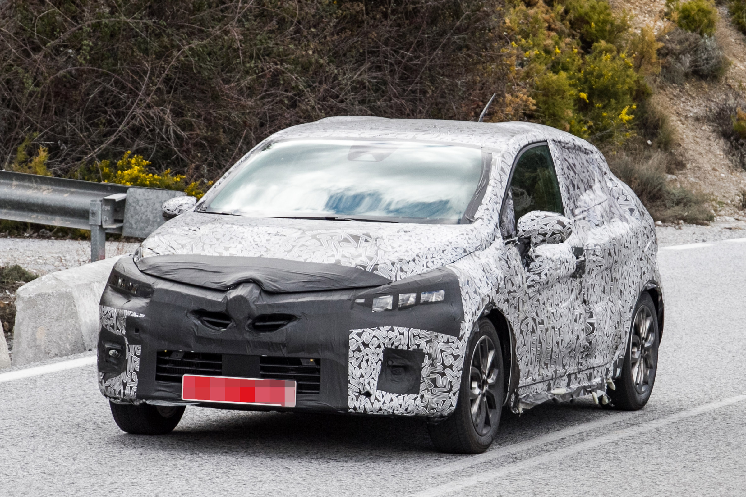 2019 Renault Clio spy shot front quarter