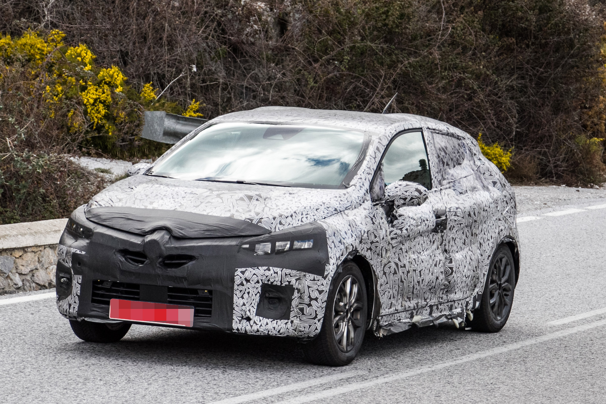 2019 Renault Clio spy shot front quarter